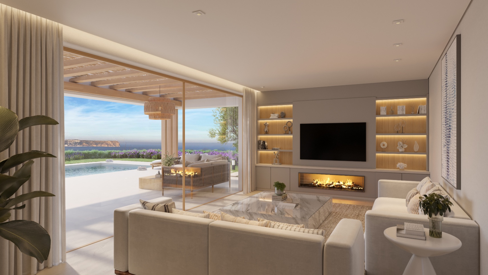 Salón moderno con mesa de mármol, chimenea integrada y estanterías de madera iluminadas, con acceso directo a la terraza, piscina y vistas al mar Mediterráneo.