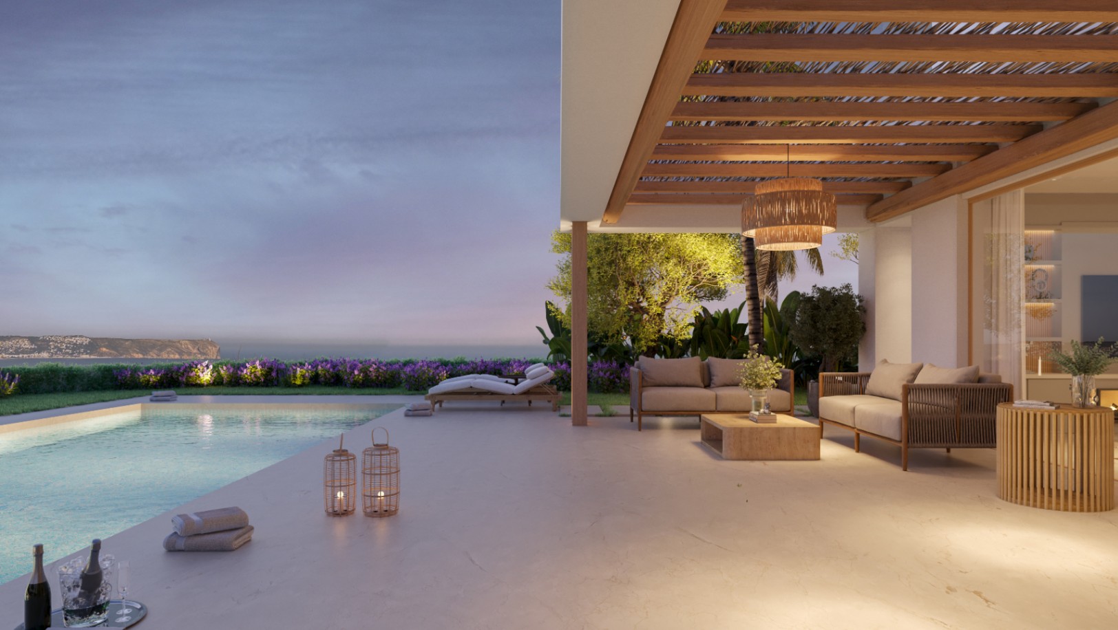 Terraza con suelo de piedra, pérgola de madera y zona de estar frente a una piscina infinita con vistas al mar al atardecer. La iluminación cálida resalta los materiales naturales.