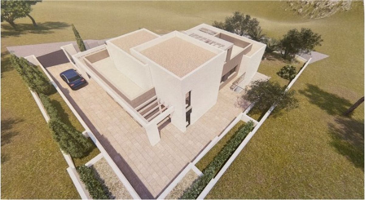 Vista aérea de una villa moderna con volúmenes cúbicos, fachadas de piedra clara, pérgolas integradas y zona de aparcamiento pavimentada rodeada de vegetación mediterránea.