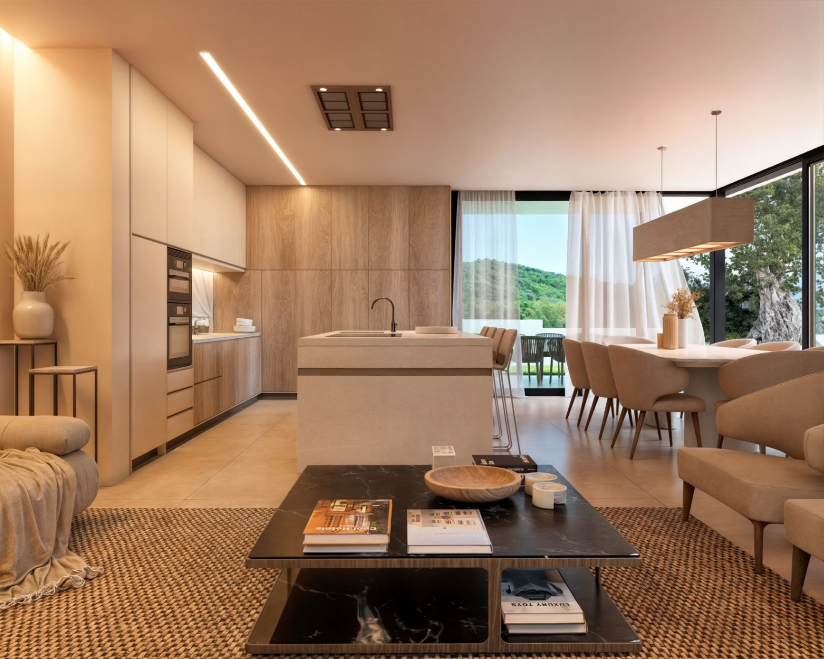 Espacio diáfano con cocina minimalista de madera, isla central de piedra y comedor con vistas a la montaña a través de grandes ventanales y cortinas traslúcidas.